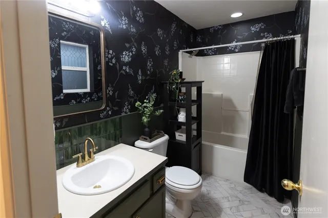 a view of a living room and dining room