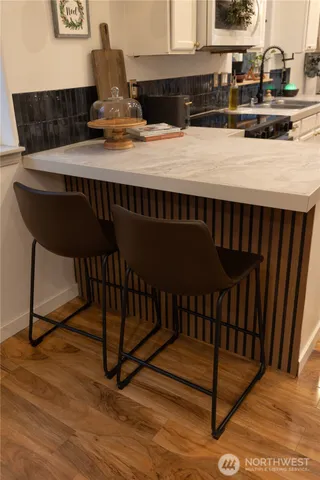 a bed room with a bed and a fish tank