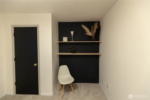 a bathroom with a sink vanity and mirror