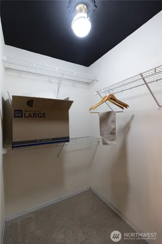 a hallway with cabinets