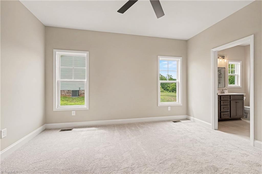 132 Knight Farm Road Stokesdale, NC 27357 - Photo 29 of 44 Primary Bedroom