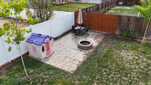1437 925 South Vernal, UT 84078 - Photo 43 of 47 Paved patio area featuring a built-in fire pit
