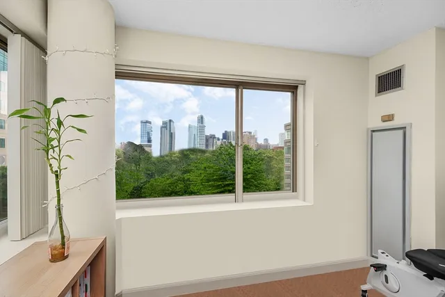 a view of a room that has a window in it