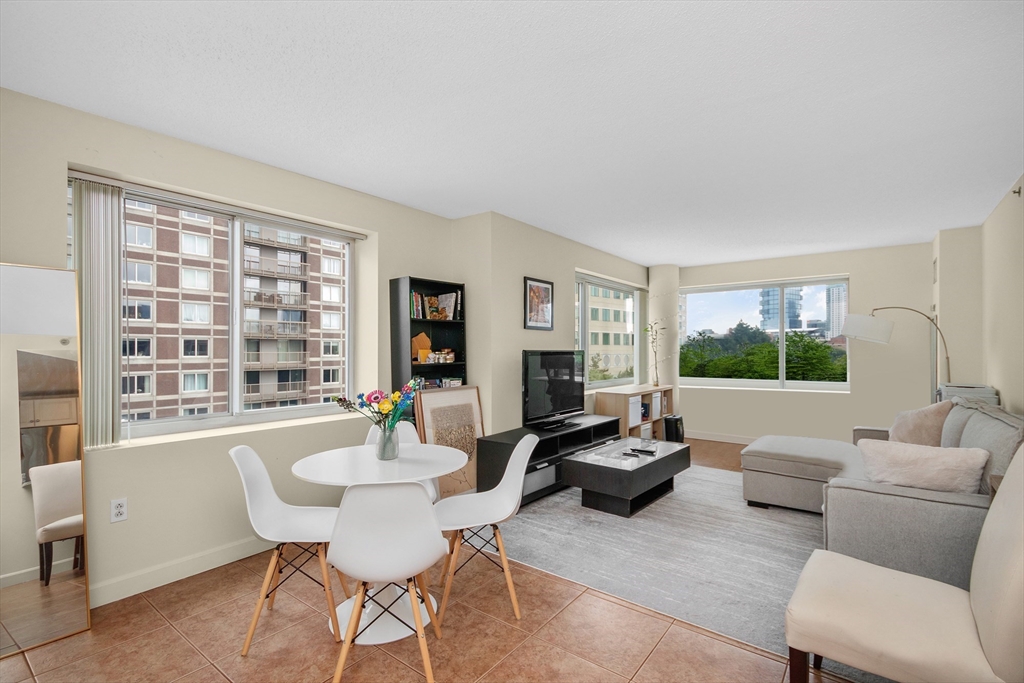 8 Museum Way, Unit 504 Cambridge, MA 02141 - Photo 4 of 30 a living room with furniture and a large window