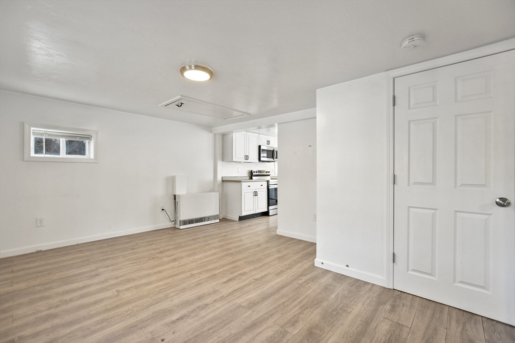 800 Patriots Road Templeton, MA 01468 - Photo 9 of 31 a view of a kitchen with wooden floor and windows