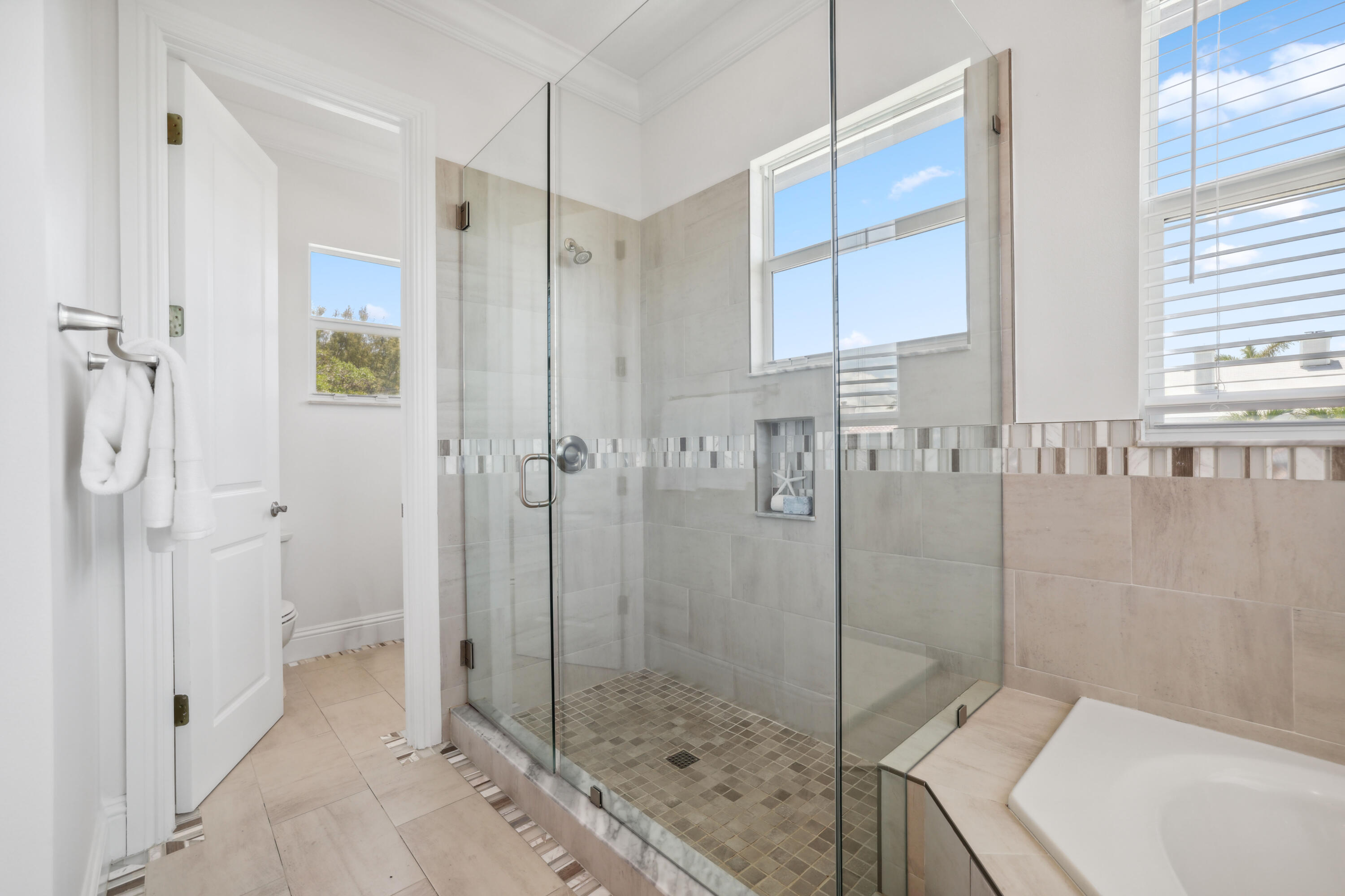 1030 Rhodes Villa Avenue Delray Beach, FL 33483 - Photo 64 of 76 a bathroom with a shower