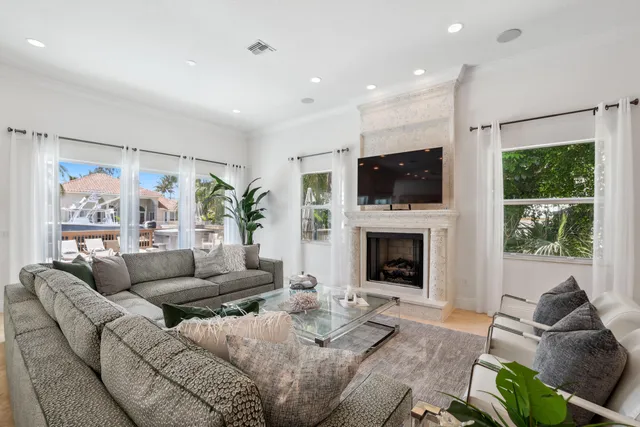 a bathroom with a sink mirror and toilet