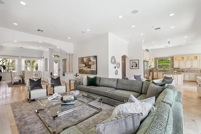a large kitchen with cabinets and stainless steel appliances