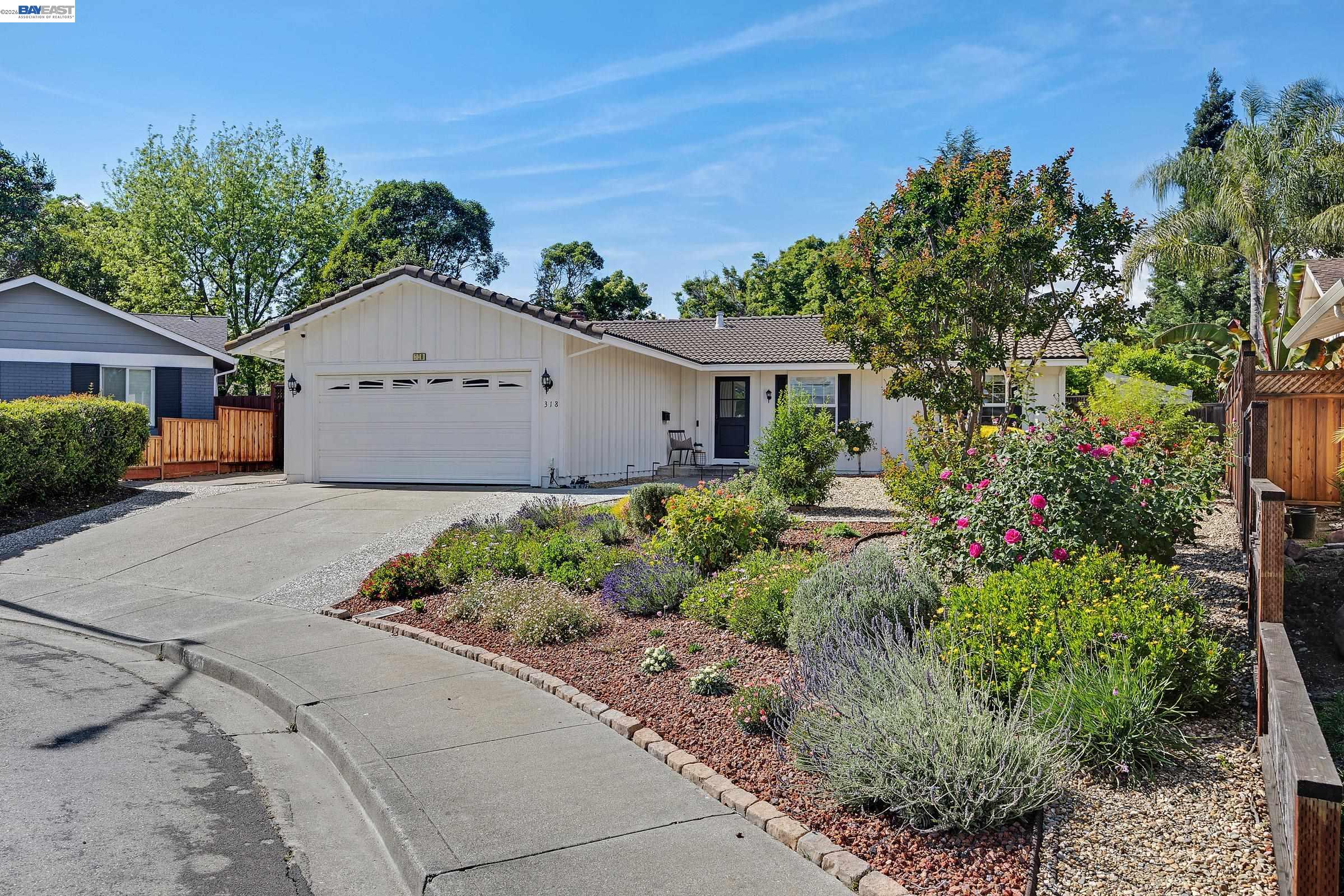 318 Almond Court San Ramon, CA 94583 - Photo 1 of 41 a front view of a house with a yard