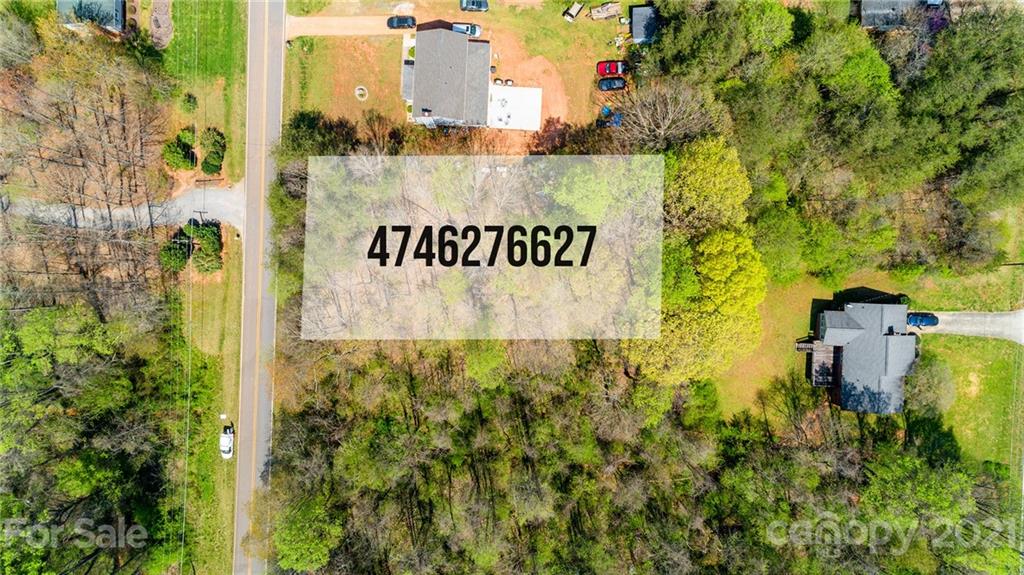 0 Kingswood Road, Unit 7 Statesville, NC 28625 - Photo 3 of 15 a sign that is on the side of the road
