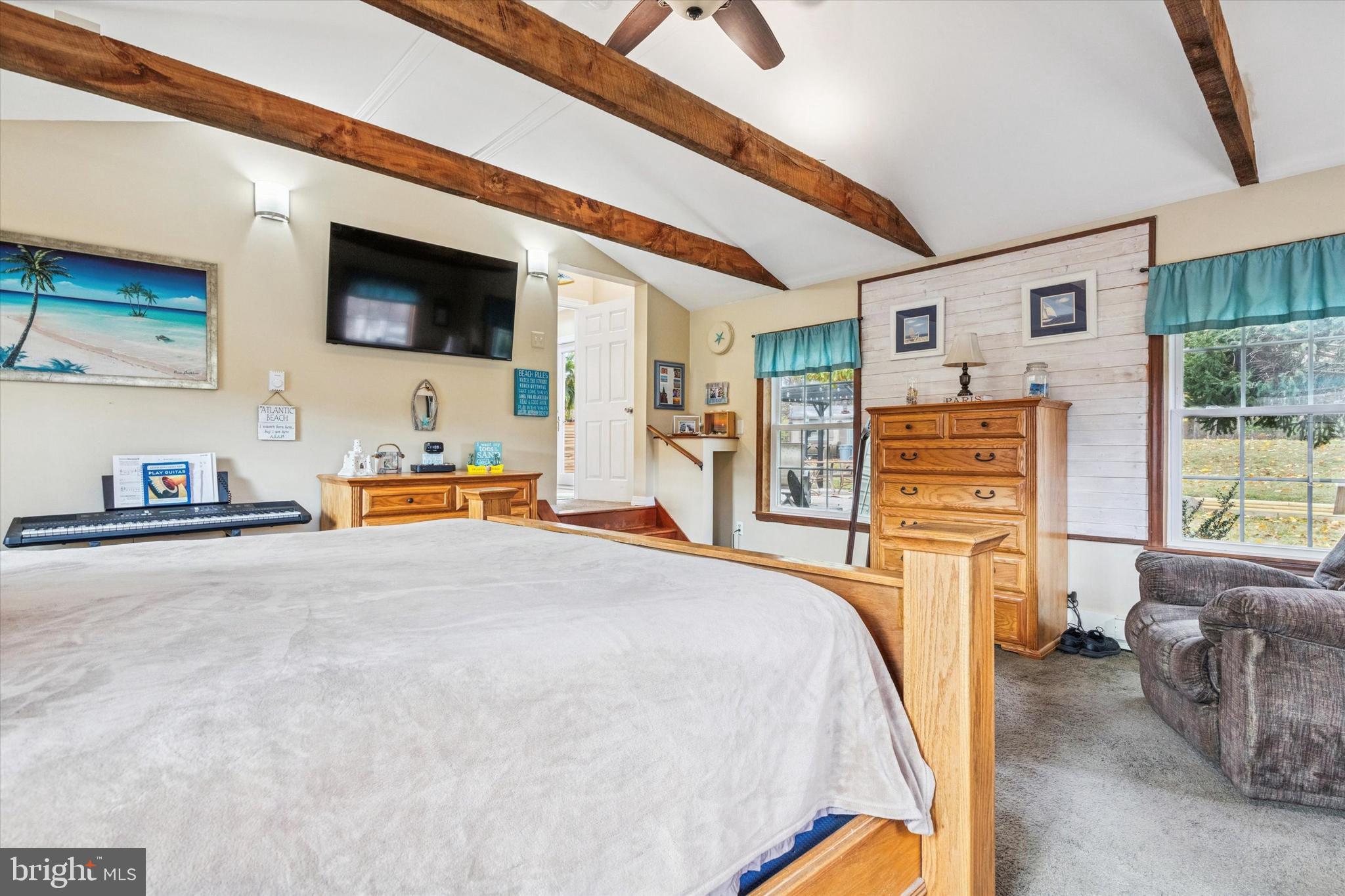 59 Houck Road Schwenksville, PA 19473 - Photo 24 of 39 a bed room with a bed and a television