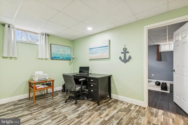 a workspace with furniture and window