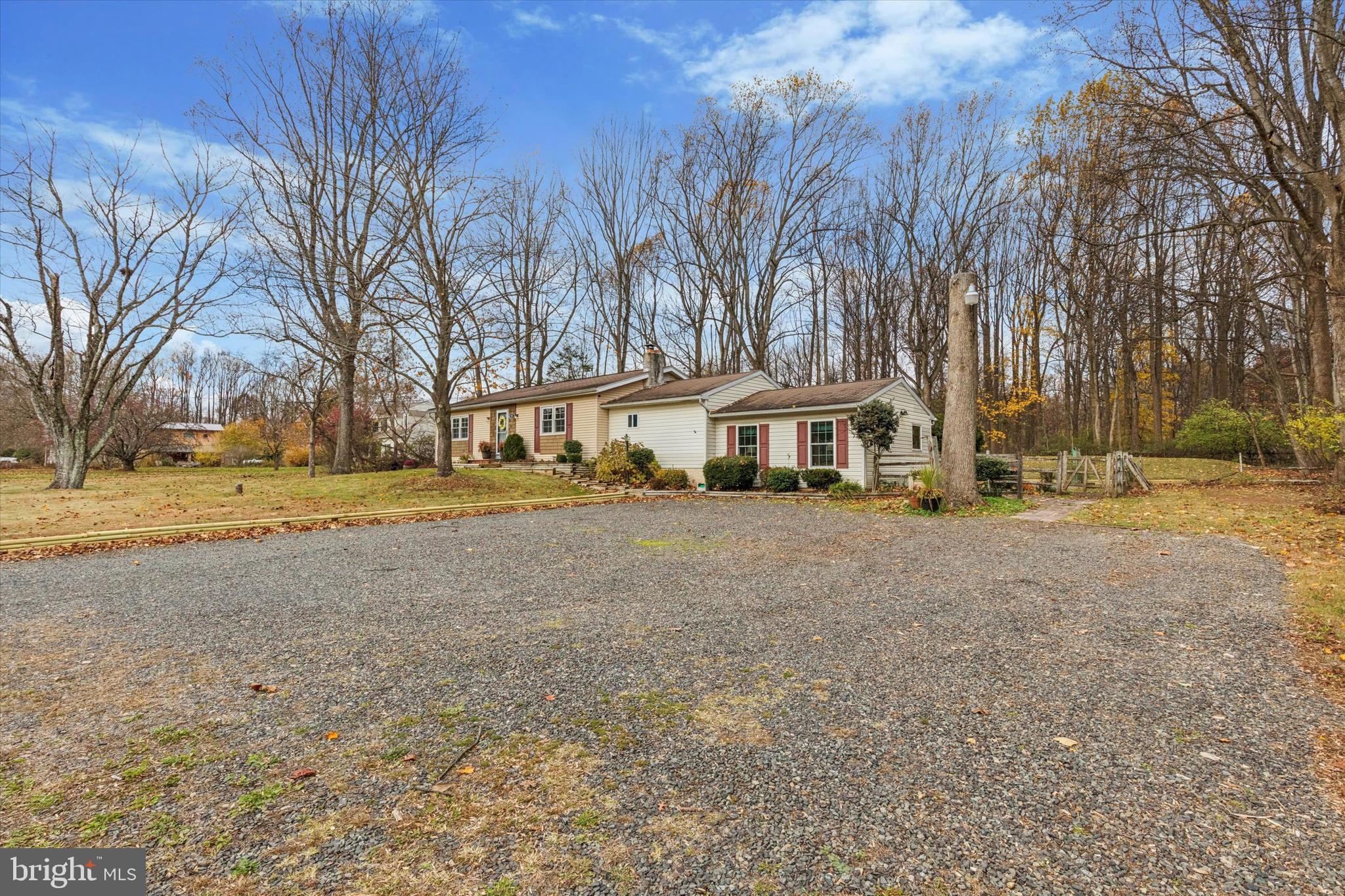 59 Houck Road Schwenksville, PA 19473 - Photo 5 of 39 a front view of a house with a yard