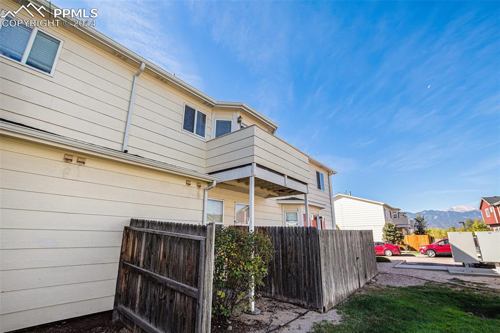4822 Rusty Nail Point, Unit 201 Colorado Springs, CO 80916 - Photo 30 of 33 a view of street along with house and trees