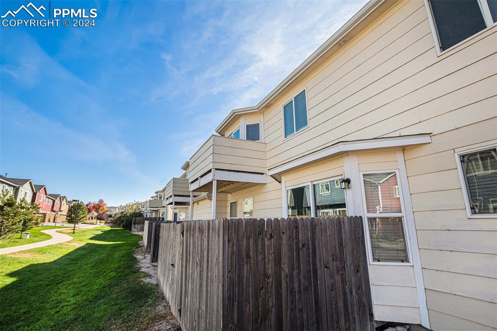 4822 Rusty Nail Point, Unit 201 Colorado Springs, CO 80916 - Photo 31 of 33 a front view of house with yard
