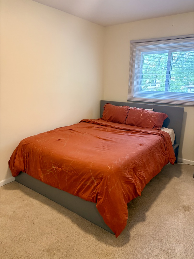 325 Rockhurst Road Bolingbrook, IL 60440 - Photo 15 of 17 a bedroom with a bed and a window