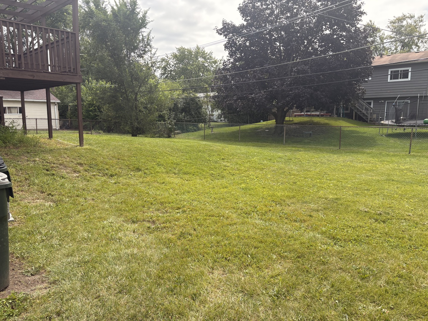 325 Rockhurst Road Bolingbrook, IL 60440 - Photo 2 of 17 a view of a swimming pool with a yard