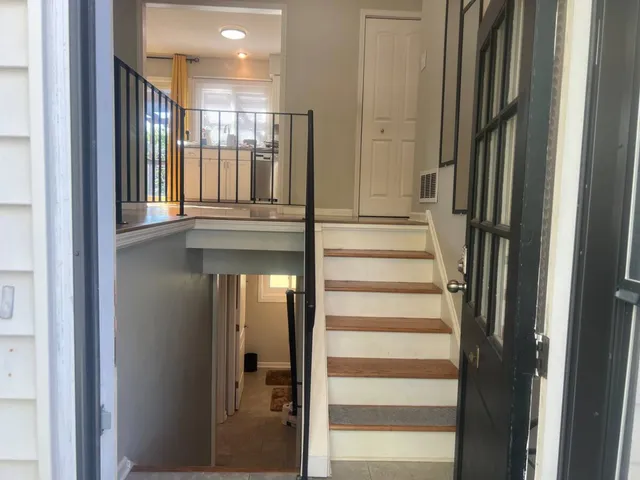 a view of a entryway of a livingroom