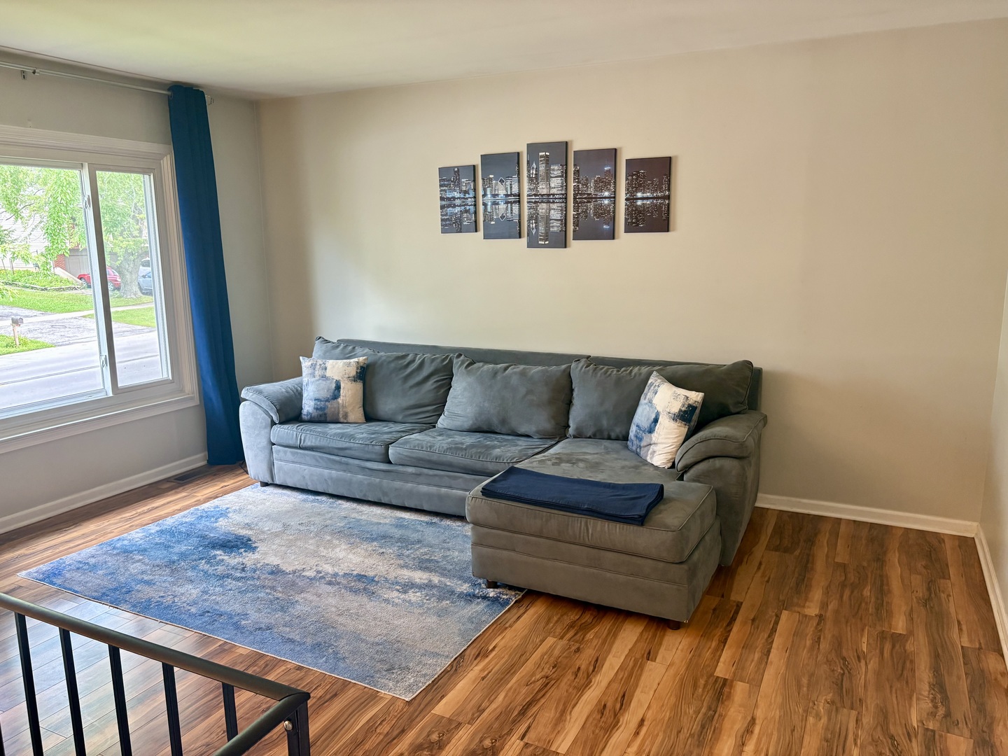 325 Rockhurst Road Bolingbrook, IL 60440 - Photo 4 of 17 a living room with a couch and a table