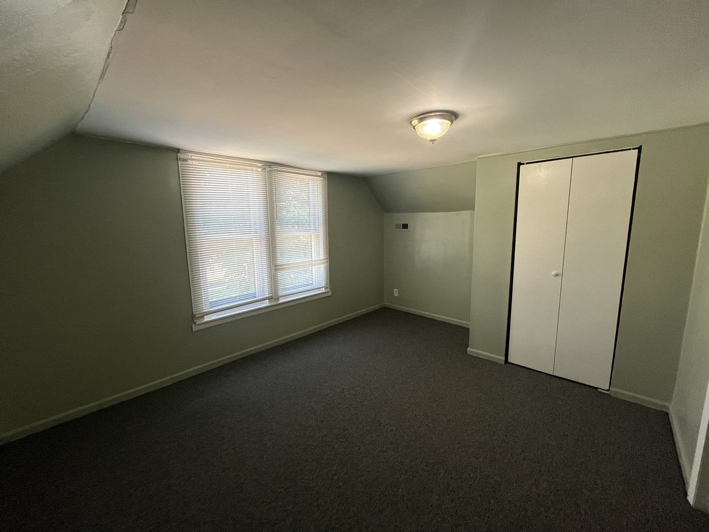 6916 South Lowe Avenue Chicago, IL 60621 - Photo 12 of 22 an empty room with windows