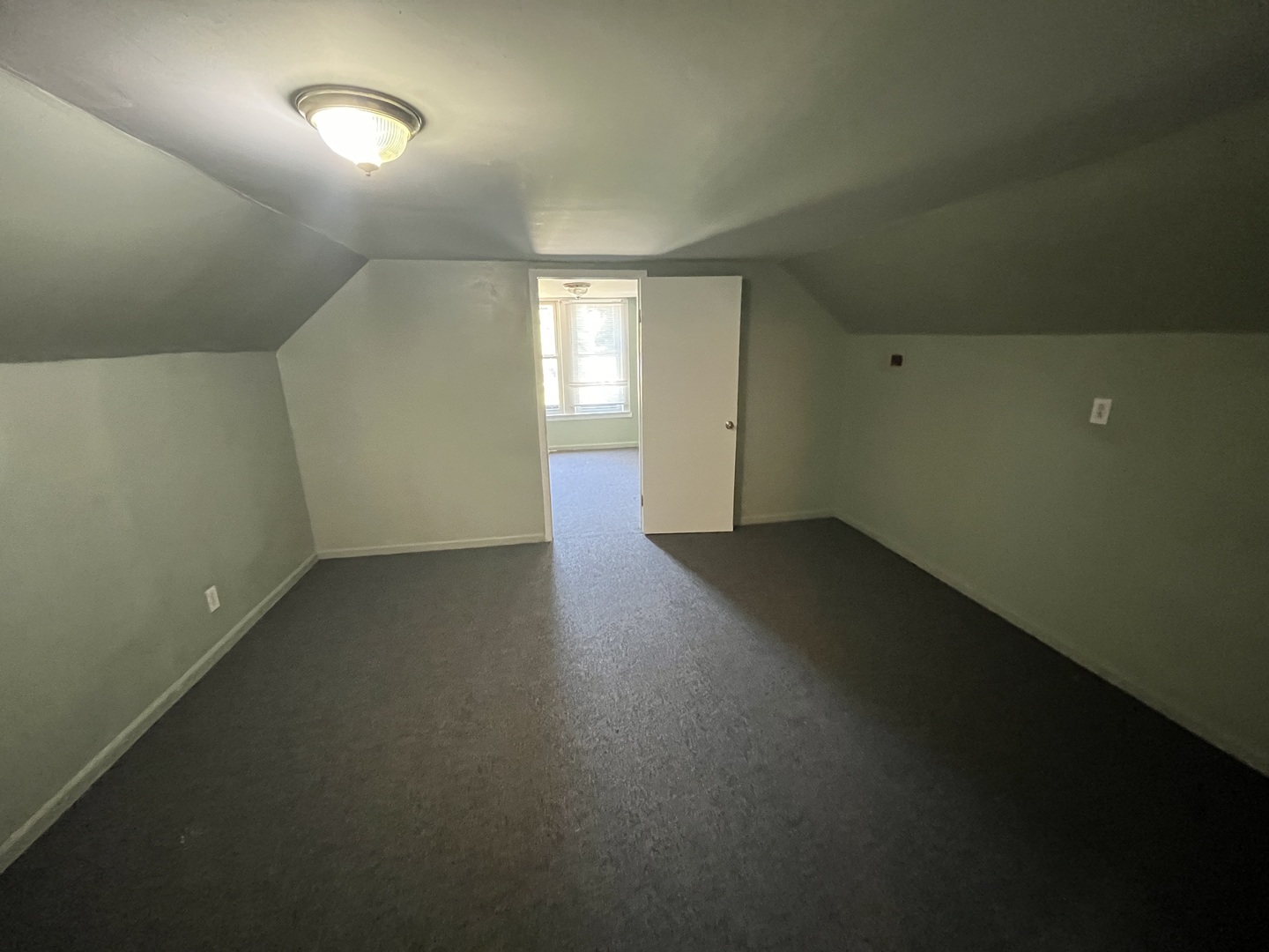 6916 South Lowe Avenue Chicago, IL 60621 - Photo 13 of 22 an empty room with a empty space and windows