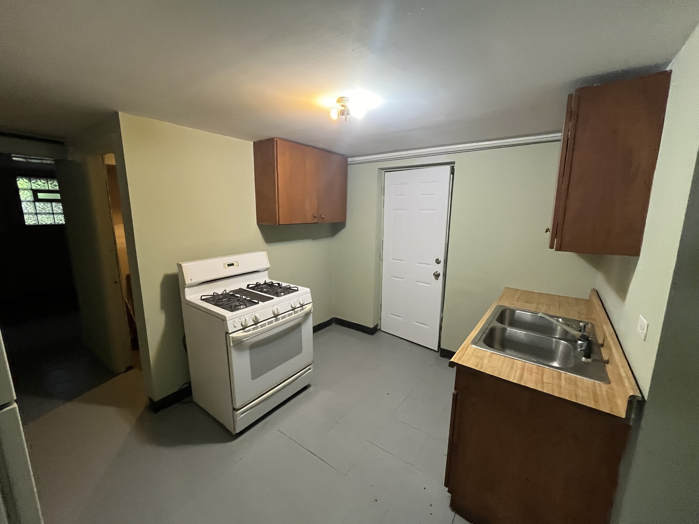 6916 South Lowe Avenue Chicago, IL 60621 - Photo 17 of 22 a kitchen with appliances and cabinets