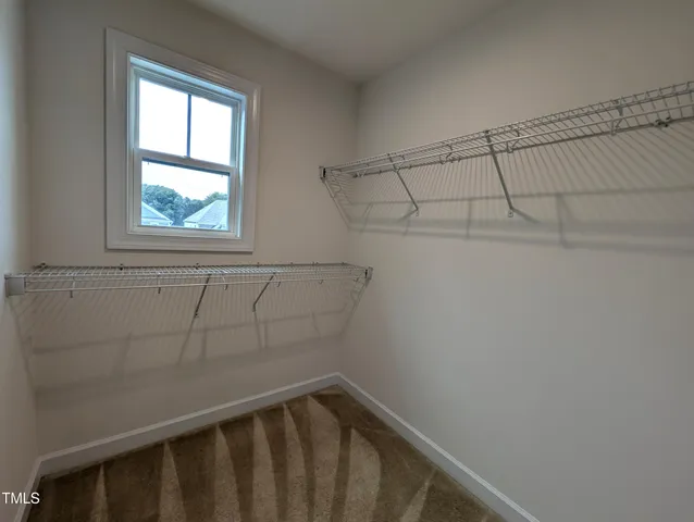 a view of small space with racks on the wall
