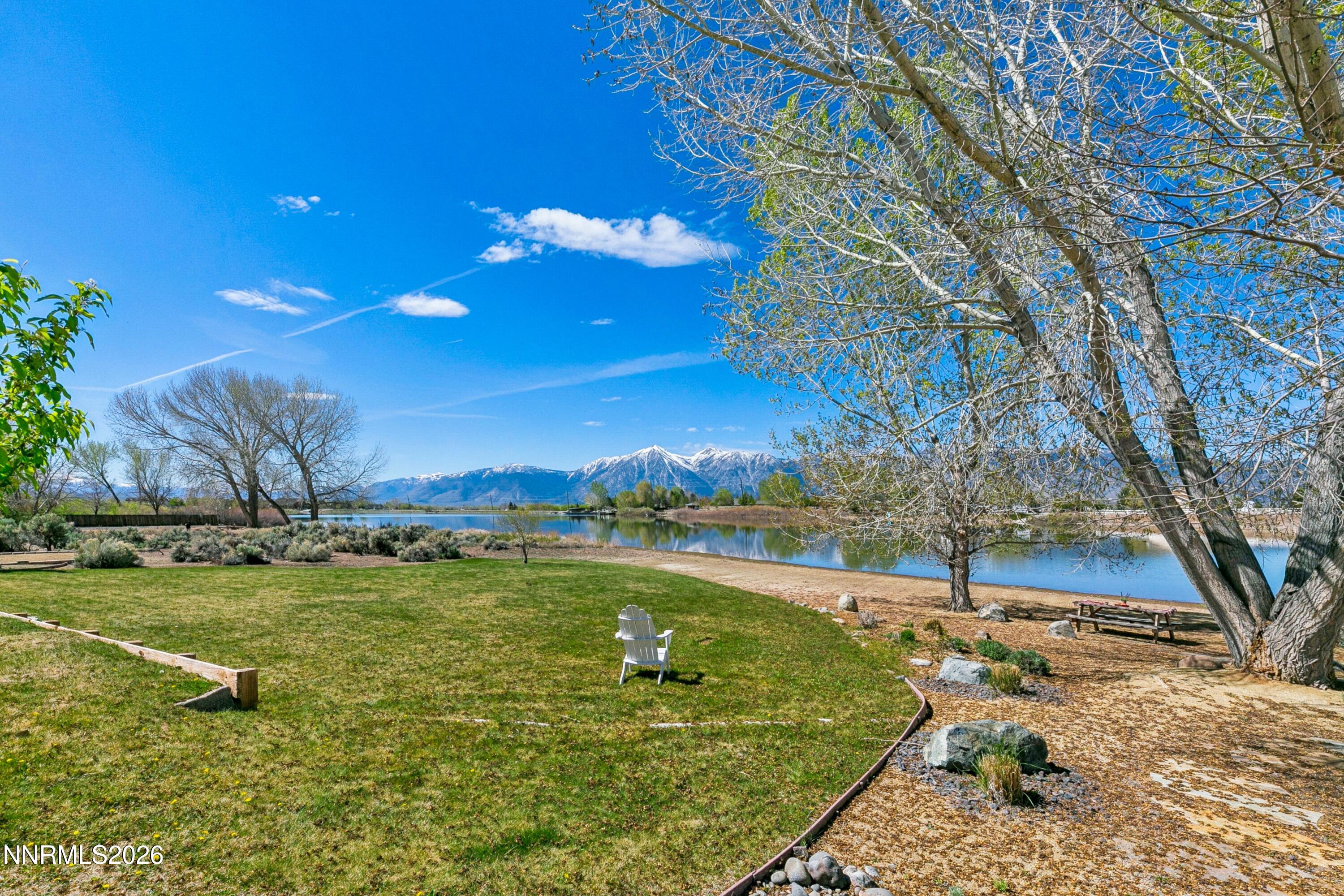 1608 East Valley Road Gardnerville, NV 89410 - Photo 46 of 54 a view of a lake with a yard