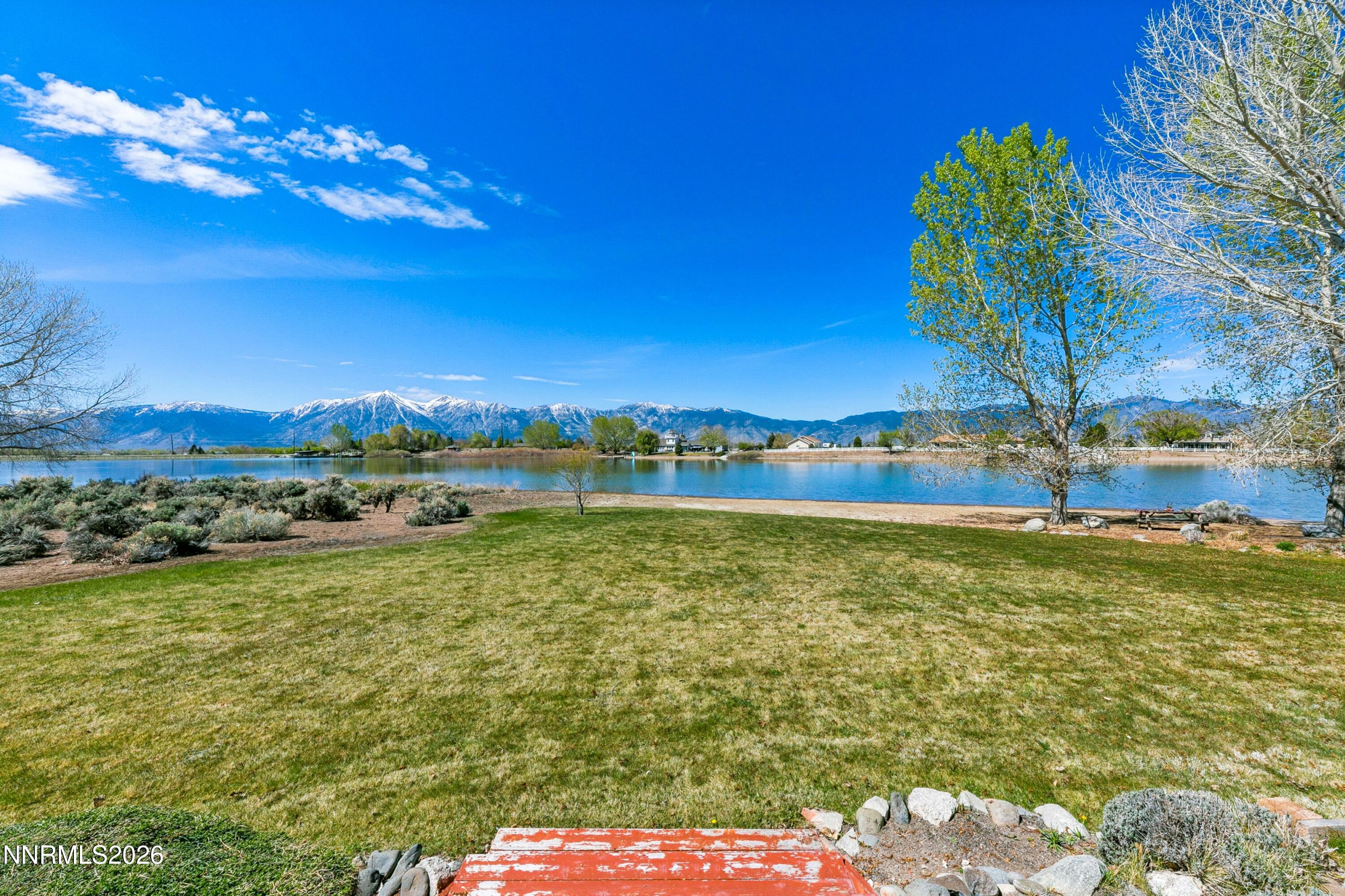 1608 East Valley Road Gardnerville, NV 89410 - Photo 49 of 54 a view of a lake with a big yard