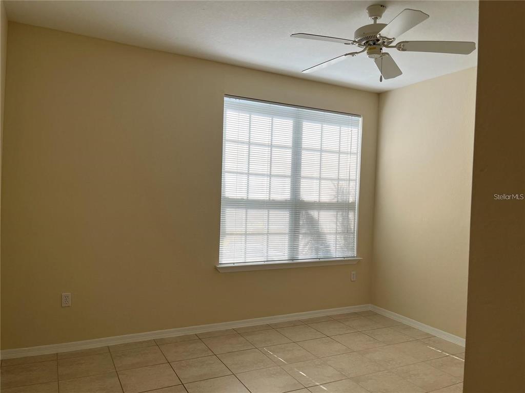 5521 Rosehill Road, Unit 103 Sarasota, FL 34233 - Photo 11 of 24 a view of an empty room with a window