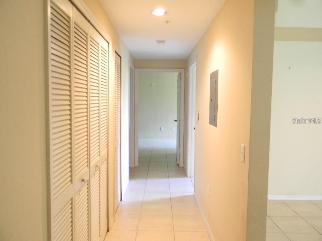 5521 Rosehill Road, Unit 103 Sarasota, FL 34233 - Photo 15 of 24 a view of a bathroom with a shower curtain
