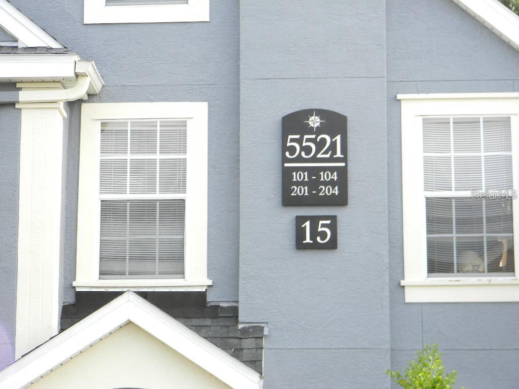 5521 Rosehill Road, Unit 103 Sarasota, FL 34233 - Photo 3 of 24 a view of a door and a window