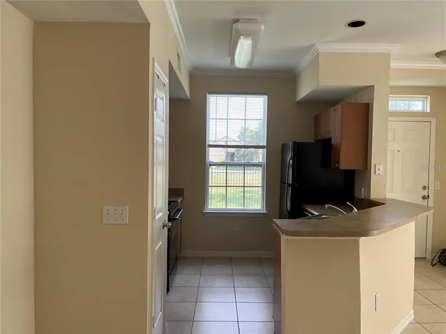 a room with a sink and cabinets