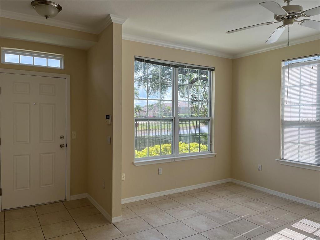 5521 Rosehill Road, Unit 103 Sarasota, FL 34233 - Photo 9 of 24 a view of an empty room with a window