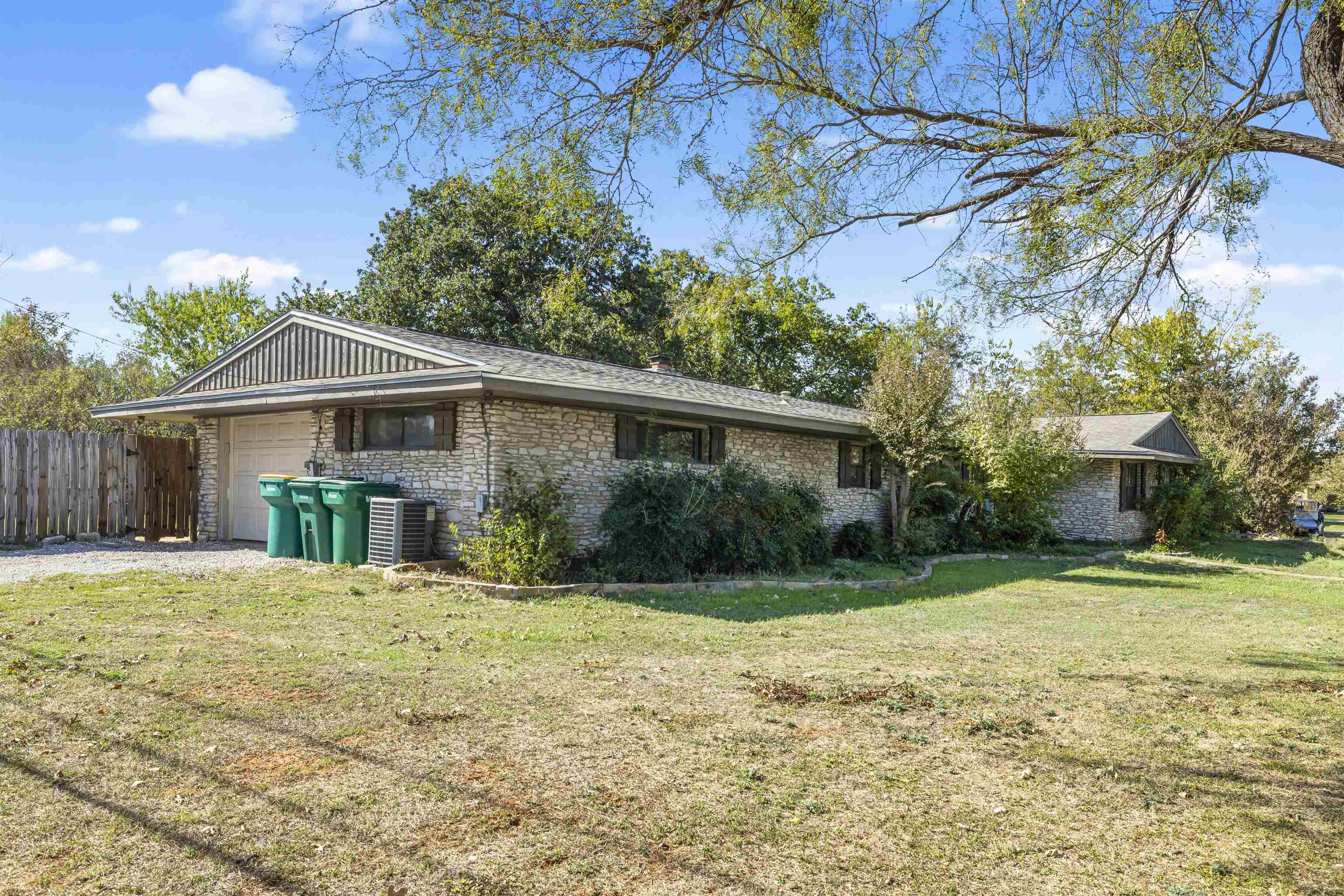 1401 Brazos Street Marble Falls, TX 78654 - Photo 20 of 23 a view of a house with a yard