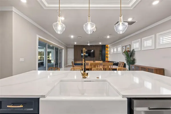 a spacious bedroom with a bed and a couch