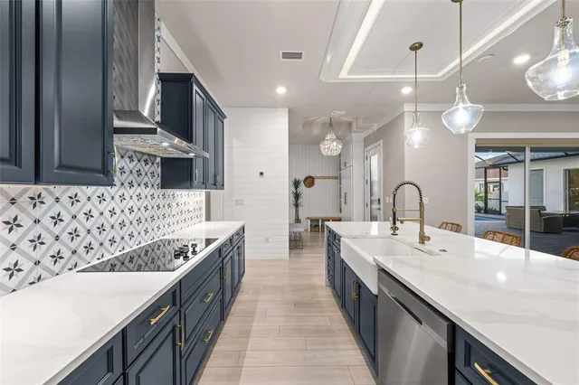 a spacious bedroom with a bed and a potted plant