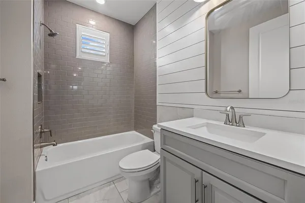 a view of storage and utility room with washer and dryer