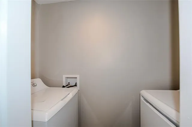 a bathroom with a shower and a sink