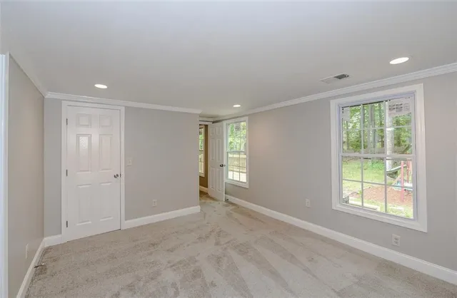 an empty room with windows