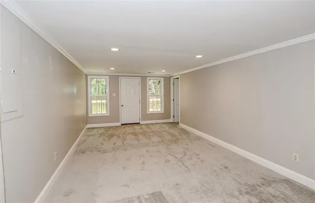 a bathroom with a shower sink and mirror