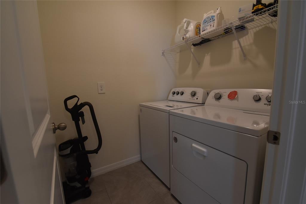 17918 Canopy Place Bradenton, FL 34211 - Photo 11 of 15 a utility room with dryer and washer
