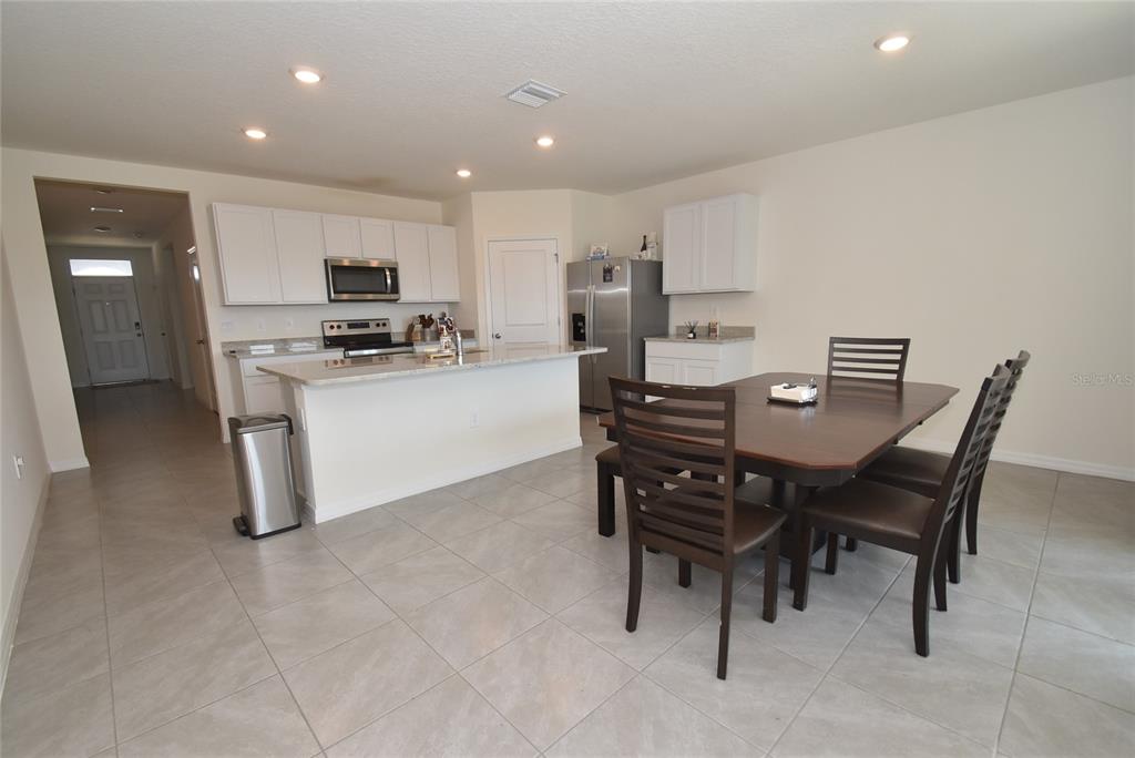 17918 Canopy Place Bradenton, FL 34211 - Photo 10 of 15 a view of a dining room with furniture