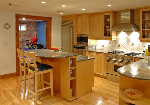 9 Symphony Road Boston, MA 02115 - Photo 1 of 9 a kitchen with stainless steel appliances granite countertop a stove a sink and a microwave