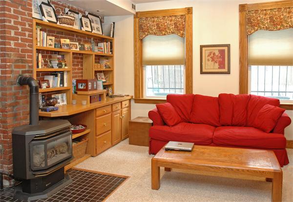 9 Symphony Road Boston, MA 02115 - Photo 7 of 9 a living room with furniture and a window