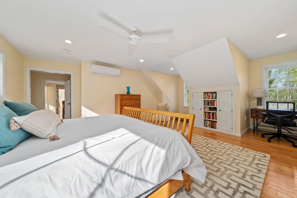 1563 Bay Road Sharon, MA 02067 - Photo 20 of 41 a bedroom with a bed and a couch