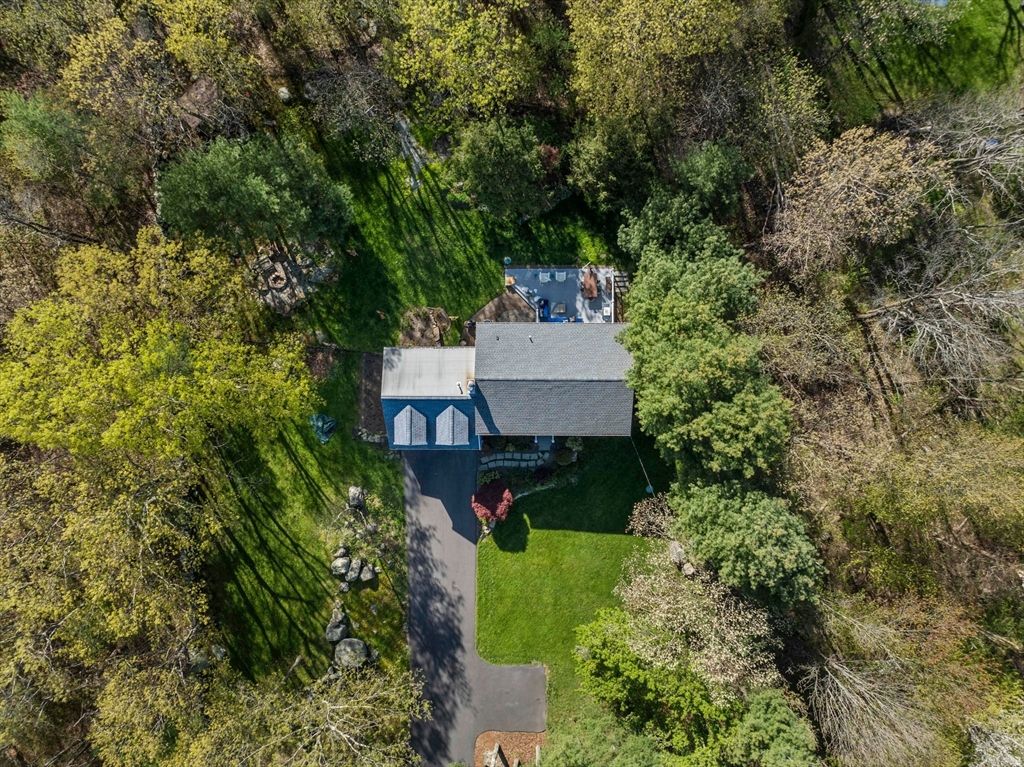 1563 Bay Road Sharon, MA 02067 - Photo 40 of 41 an aerial view of a house with a yard and garden