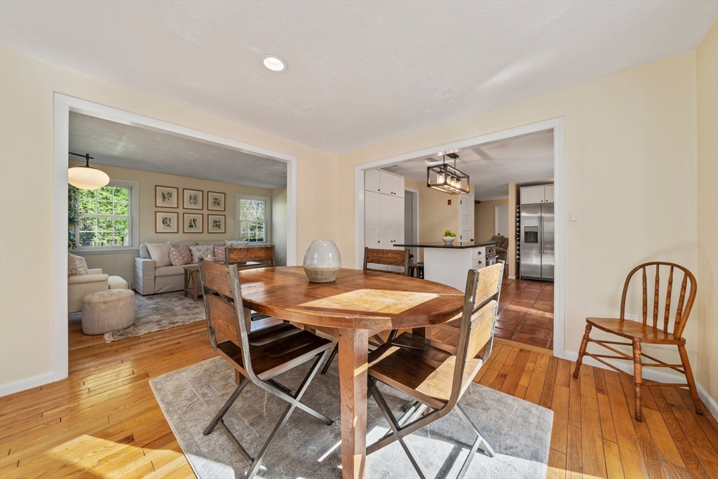 1563 Bay Road Sharon, MA 02067 - Photo 7 of 41 a view of a dining room with furniture and wooden floor
