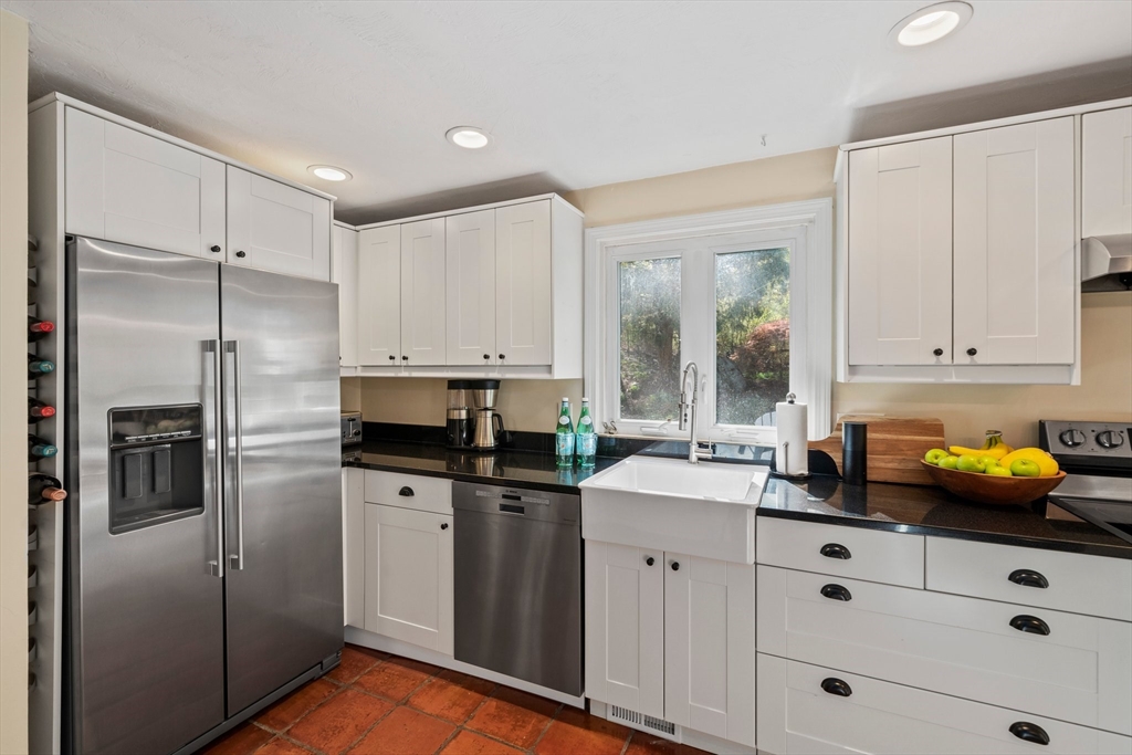 1563 Bay Road Sharon, MA 02067 - Photo 10 of 41 a kitchen with a sink appliances and cabinets