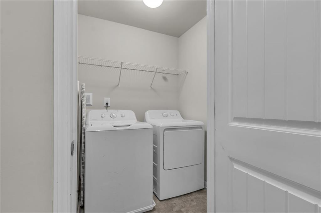 171 Pinnacle Point Court Dallas, GA 30132 - Photo 14 of 26 a utility room with dryer and washer